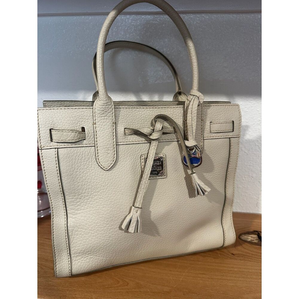 Dooney & Bourke East West Tassel Purse Bone EUC